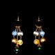 Pendientes oro y pedreria.